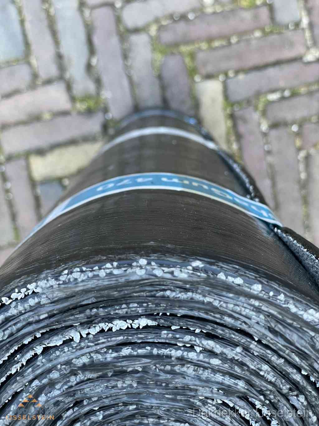 Rol bitumen dakleer met leislag voor plat dak in IJsselstein